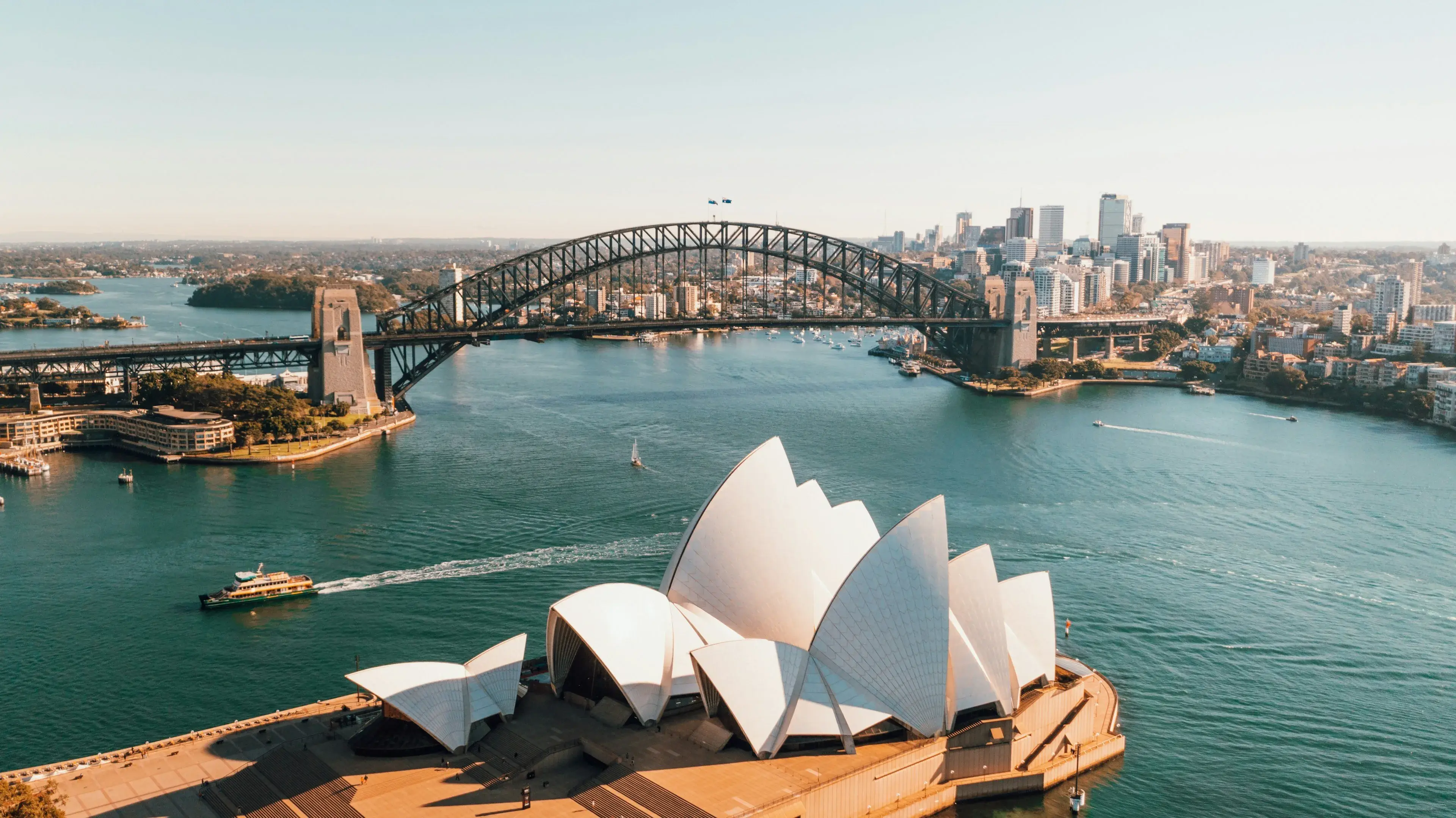 Sydney Opera House and Harbour Bridge from above on a clear day