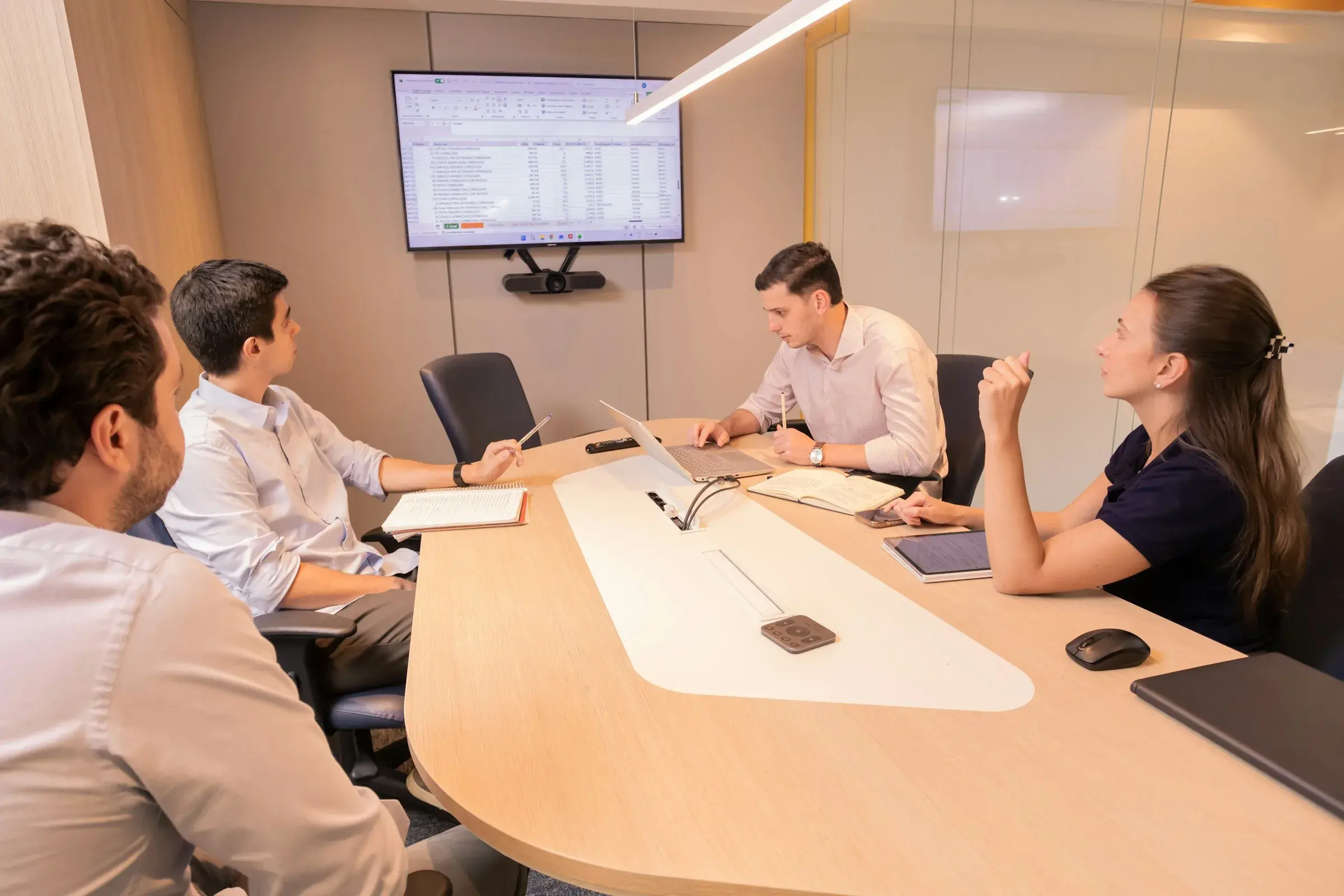 A practice team meeting around a conference table